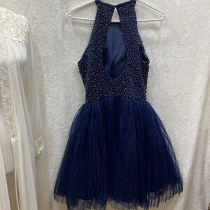 Stunning beaded and tulle dress very well made!